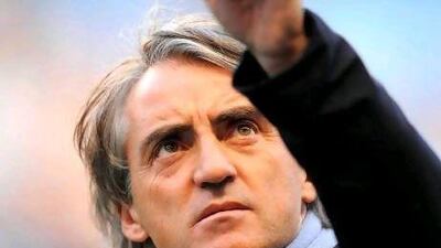 Roberto Mancini manager of Manchester City points .Barclays Premier League match between Manchester City v Manchester Utd at the Etihad Stadium, Manchester on the 30th April 2012. Simon Bellis / ZUMA Press)