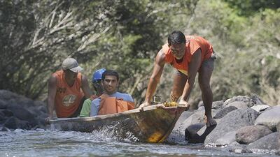 Members of the Beyond Borders team preparing to raft through a waterfall as part of their adventure in the Philippines. Photo Courtesy-Beyond Borders