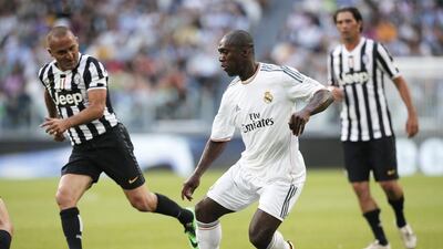 Former Real Madrid midfielder Clarence Seedorf, centre, controls the ball during the Unesco Cup football match between Juventus Legends and Real Madrid Leyendas on Monday at Juventus Stadium in Turin, Italy. Marco Bertorello / AFP / June 2, 2014