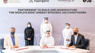 Dr Sultan Al Jaber, Minister of Industry and Advanced Technology, and Sarah Al Amiri, Minister of State for Public Education and Future Technology, watch as Lin Kayser from Hyperganic, Ismail Abdulla from Strata and Markus Glasser from EOS sign the partnership agreement. Wam