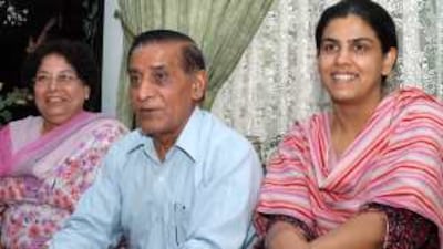 Mohammed and Riffat Sharif and their daughter-in-law Sumaiya, right, watch Obama's speech.