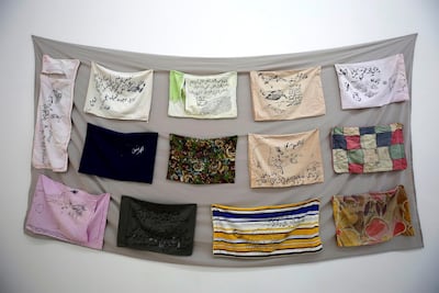 Ali Eyal's textile work 'Painting Size 80 x 60cm' in 'Theater of Operations' at MoMA PS1. Getty