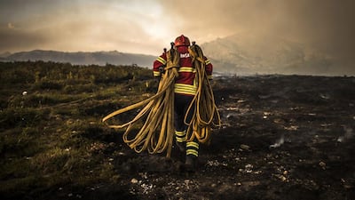 Firemen tackle the forest fire in the area of Vila do Soajo, northern Portugal. EPA
