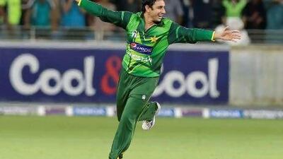 Pakistan's Saeed Ajmal celebrates taking the wicket of Australia's Cameron White during the first Twenty20 match at the Dubai International Cricket Stadium on Wednesday, September 5, 2012. Hassan Ammar / AP Photo