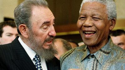 Fidel Castro with South African president Nelson Mandela at a ceremony marking the 50th anniversary of the General Agreement of Tariffs and Trade, during the ministerial conference of the World Trade Organisation (WTO) in Geneva, Switzerland, on May 19, 1998. Patrick Aviolat / EPA