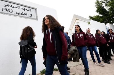 In Tunisian high schools, the dress code is not uniform. Actually, it is: but only for girls. Fethi Belaid / AFP