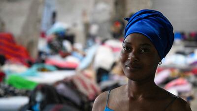 A displaced African migrant worker in Beirut on October 21. Integrating displaced people into the digital workforce can reduce the financial burden of hosting such populations, while refugees gain financial independence and dignity. AFP
