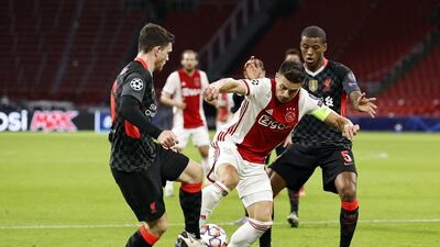 Dusan Tadic - 6: Worked the channel between Gomez and Robertson effectively and harried the Liverpool defence. Drifted out of the game in the second period. PA