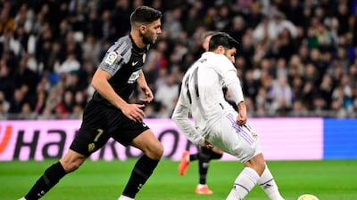 Real Madrid's Spanish midfielder Marco Asensio scores his side's first goal. AFP