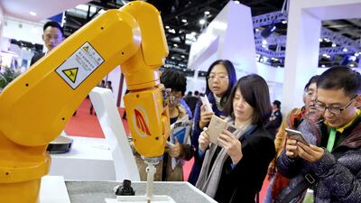 The robots displayed at the World Robot Conference are divided into industrial, service and specialised categories. Wu Hong / EPA