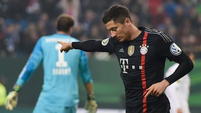 Bayern Munich's Robert Lewandowski celebrates after scoring their first goal in a 3-1 win over Hamburg in the DFB-Pokal on Wednesday night in Hamburg. Odd Andersen / AFP / October 29, 2014