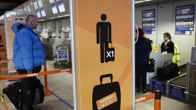 A queue at London Luton Airport. Simon Dawson / Bloomberg