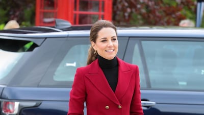 The Duchess of Cambridge wears a Philosophy by Lorenzo Serafini blazer over a black polo neck and black jeans, Aquatalia Rhumba platform boots and an Aspinal Midi Mayfair bag with Kiki McDonough visiting Halen Mon Anglesey Sea Salt in North Wales on May 8. Getty Images