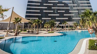 Looking up at the sky-bridge at the Gate Towers. Courtesy Aldar