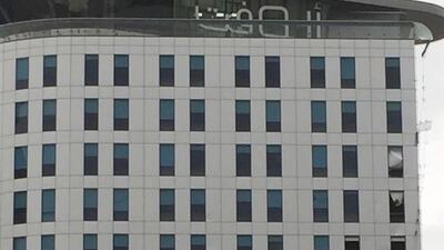 Windows at the Aloft hotel in Abu Dhabi are damaged during the rain storm. Ravindranath K / The National