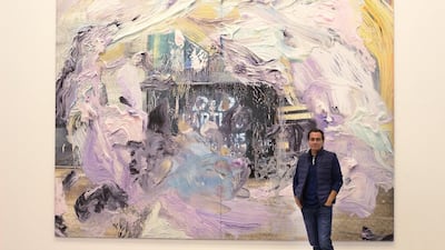 Retail magnate Tony Salame poses in front of one of the artworks from his collection on display at his newly opened Aishti Foundation, which is housed in a futuristic building on the coast just outside of Beirut. Josh Wood for The National