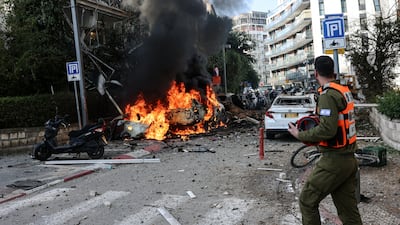 Iranian missiles hit Tel Aviv and nearby areas, injuring at least six people. Reuters