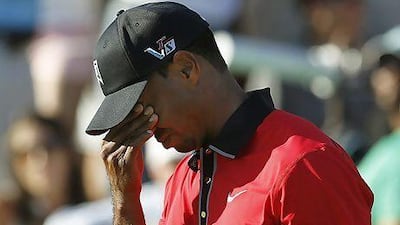 Tiger Woods missing a birdie putt that would have put him in a tie for the lead in the final round of the Barclays tournament. Gary Hershorn / Reuters