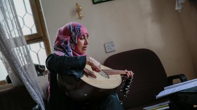 A female Yemeni music student practices playing Oud during a music class at the Cultural Centre in Sanaa, Yemen. Hani Mohammed / AP Photo