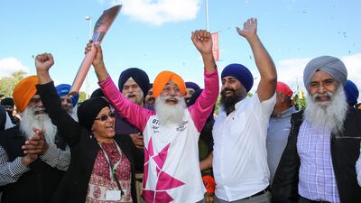 Parmjit Singh raises the baton in Smethwick, England. Getty Images