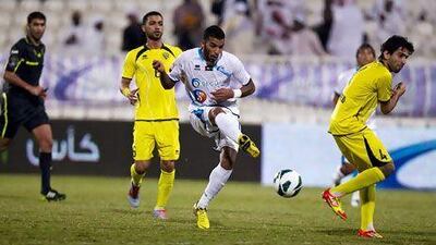 Abu Dhabi, United Arab Emirates, December 27, 2012: Bani Yas' Khalid Mubarak gets a shot on net against Kalba during their Etisalat Cup match at Baniyas Stadium in Abu Dhabi on December 27, 2012. Christopher Pike / The National