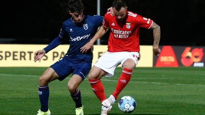 Belenenses's Henrique Pires in action against Benfica's Haris Seferovic. EPA