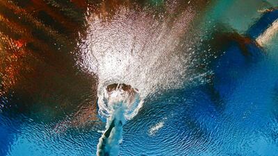 Tania Cagnotto of Italy is seen underwater during the women’s 3m springboard semi final at the Aquatics World Championships in Kazan, Russia July 31, 2015. REUTERS/Stefan Wermuth