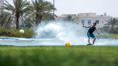 Beating the heat at Al Forsan wakeboarding cable park. -- Rob Dam in action. Victor Besa/The National