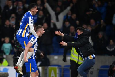Adam Webster of Brighton & Hove Albion celebrates with Jakub Moder after scoring their team's equaliser. Getty Images