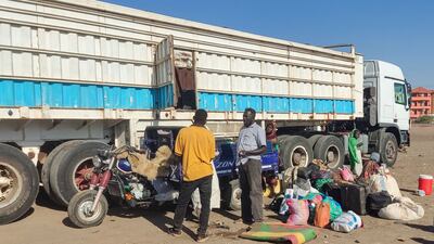 Displaced people fleeing Wad Madani in Sudan's Al Gezira state arrive in Gedaref on Sunday. AFP