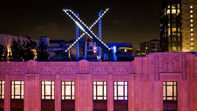 The X sign atop the company headquarters, formerly known as Twitter, in downtown San Francisco. Since Mr Musk acquired the social media company in October, X has struggled to retain advertisers. AP