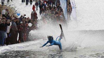 A skier falls face first into the pool at the Gornoluzhnik event. Ilya Naymushin / Reuters / April 20, 2014