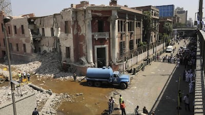 The Italian consulate in Cairo after a car bomb killed one and injuried several civilians. Amr Nabil / AP Photo