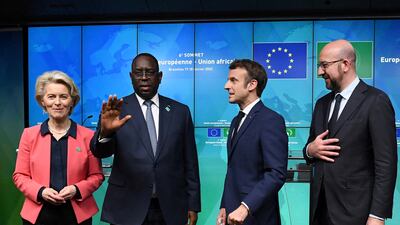 European Commission President Ursula von der Leyen, Senegal's President Macky Sall, France's President Emmanuel Macron and European Council President Charles Michel pose after the second day of the EU-AU summit. AFP