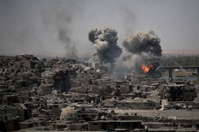 Airstrikes target ISIS positions on the edge of Mosul's Old City in 2017. AP Photo