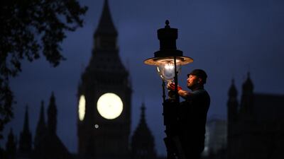 Paul Doy, an engineer, services a gas-powered lamp near the Houses of Parliament in central London. ‘I like the historical aspect of it,’ he said of his work, even if it means getting up at 5am to tend to the lamps in the fashionable district of Covent Garden. AFP