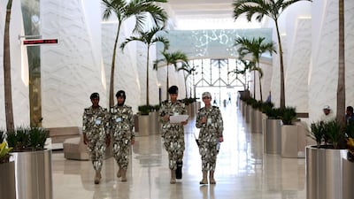 Guards walking inside Kuwait's national assembly building, also known as the Majlis Al-Umma, which is the legislature of Kuwait. Kuwait will hold snap elections on November 26, the government announced on Monday after the emir dissolved parliament. Yasser Al-Zayyat/AFP