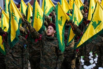 Hezbollah fighters attend the funeral of their commander Wissam Al Tawil, who was killed by an Israeli strike, in the village of Khirbet Selm, south Lebanon. AP Photo