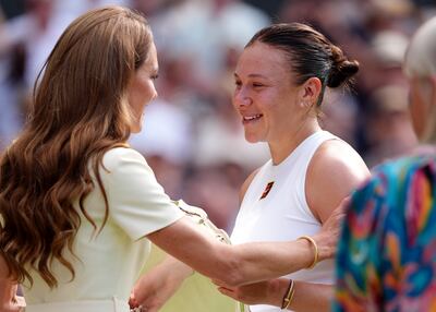 The Princess of Wales consoles Amanda Anisimova following her defeat to Iga Swiatek in the women's Wimbledon final. PA