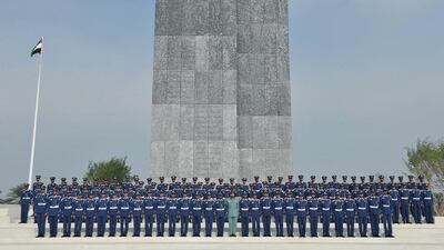 The students line up at the Wahat Al Karama memorial. Courtesy Security Media Department