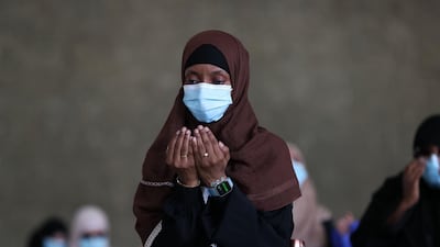 A pilgrim prays after throwing pebbles as part of the symbolic stoning of the devil during the Hajj pilgrimage in Mina, near Saudi Arabia's holy city of Makkah. AFP