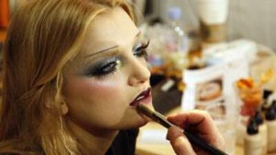 Heavy eyeliner, dark shadow and big, false lashes are the hallmarks of this season's goth look.