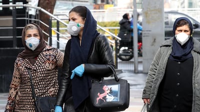 Iranian women wearing face masks walk on a street of Tehran, Iran. According to the Ministry of Health, 139 people diagnosed with the Covid-19. EPA