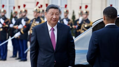 Mr Xi arrives for the dinner at the palace as part of his two-day state visit. AFP