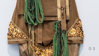 Sara Rahbar's You have broken my heart love, tie me up with chains so that I may never feel a new chain again (War). "This sculptural work is of a US Military Rucksack interlaced with prayer beads and military badges. Cultural memory and ideological symbols are remixed with a very direct, physical approach, deconstructing personal history and historic momentum alike."