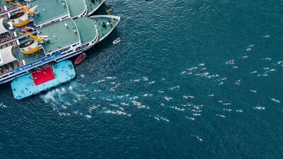 An aerial picture taken by drone shows competitors starting to swim from ferries at the Bosphorus during the Turkish Olympic Committee's 32nd Samsung Bosphorus Cross-Continental Swimming Race, in Istanbul, Turkey. EPA