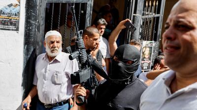 The funeral of a Palestinian man killed in an Israeli raid on Wednesday. Reuters