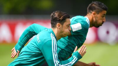 Germany's Mesut Ozil, front, has overcome a recent injury and is available for selection against Mexico, national team coach Joachim Low has said. Patrik Stollarz / AFP