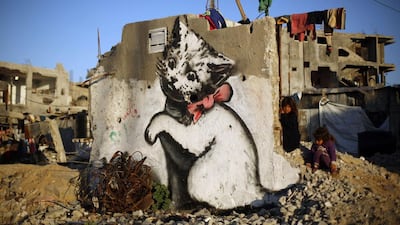 A mural of a kitten said to have been painted by Banksy. Mohammed Abed / AFP