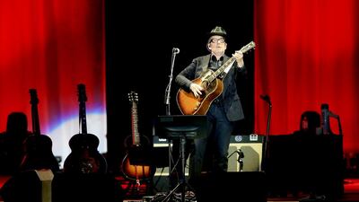 The singer and songwriter Elvis Costello performs solo, surrounded by four guitars, on day two of the Blended festival at Dubai Media City Amphitheatre in Dubai. Sarah Dea / The National / May 2/ 2014.